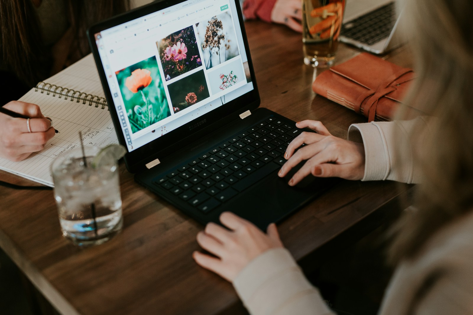 People researching online together at a laptop